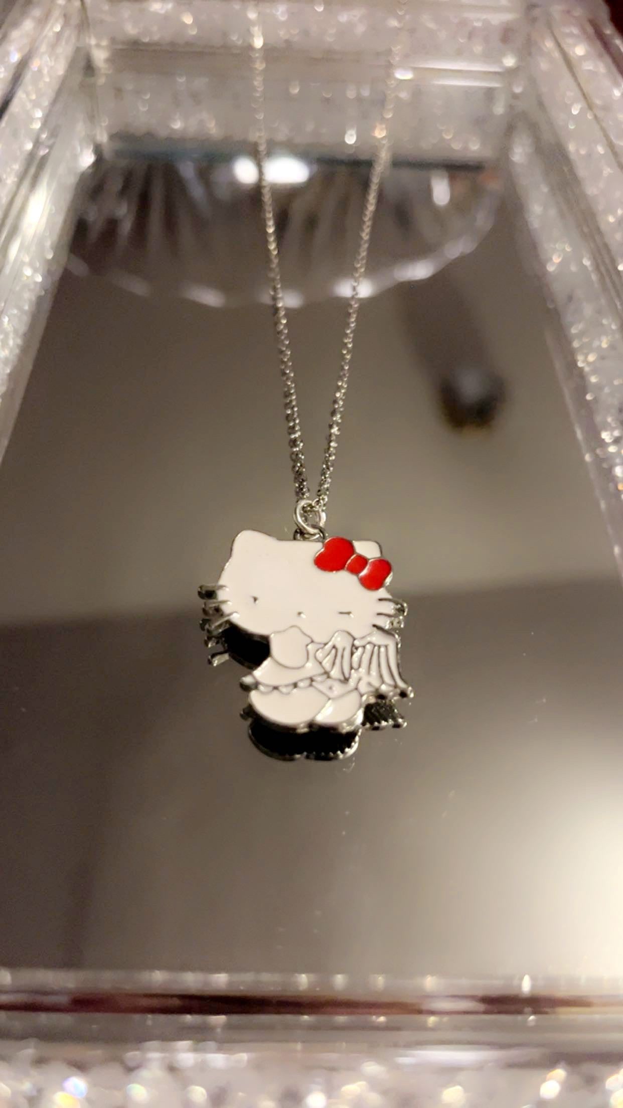 Matching hello kitty necklace