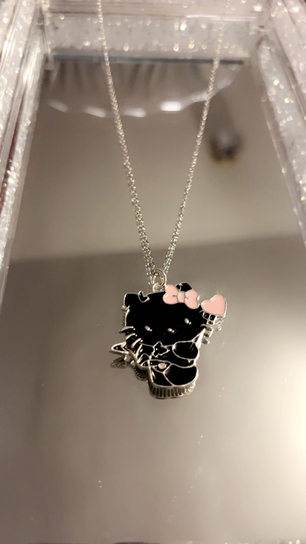 Matching hello kitty necklace